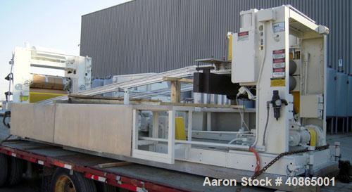  (1) 3 roll sheet stack with (3) 12" diameter x 41" wide chrome plated rolls, and (2) 12" diameter x 41" wide pattern rolls, with pumps, heat exchangers, control panel, and 16' long cooling section. ...