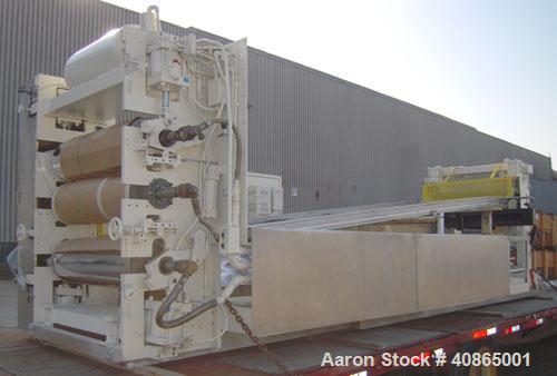  (1) 3 roll sheet stack with (3) 12" diameter x 41" wide chrome plated rolls, and (2) 12" diameter x 41" wide pattern rolls, with pumps, heat exchangers, control panel, and 16' long cooling section. ...