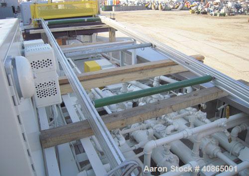  (1) 3 roll sheet stack with (3) 12" diameter x 41" wide chrome plated rolls, and (2) 12" diameter x 41" wide pattern rolls, with pumps, heat exchangers, control panel, and 16' long cooling section. ...