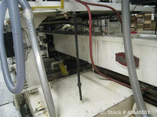 Used Welex Co-Extrusion Sheet Line consisting of the following:  (1) Welex 4.5" screw diameter, 36:1 L/D ratio. Electrically heated, water cooled side vented barrel. Unit driven by a 250 hp DC motor ...