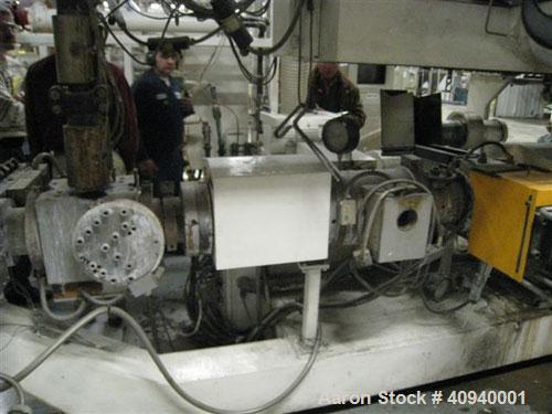 Used Welex Co-Extrusion Sheet Line consisting of the following:  (1) Welex 4.5" screw diameter, 36:1 L/D ratio. Electrically heated, water cooled side vented barrel. Unit driven by a 250 hp DC motor ...