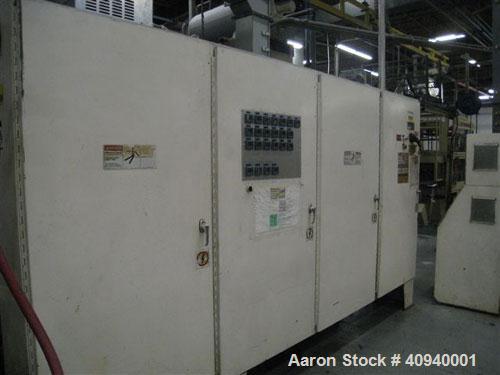 Used Welex Co-Extrusion Sheet Line consisting of the following:  (1) Welex 4.5" screw diameter, 36:1 L/D ratio. Electrically heated, water cooled side vented barrel. Unit driven by a 250 hp DC motor ...