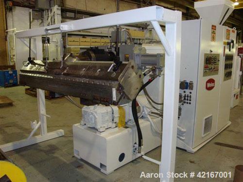 Used Welex “J” Style 78” Wide Sheet Line, Consisting Of: (1) Welex 4.5” extruder single screw extruder, 30:1 L/D ratio, side vented. Barrel is electrically heated and water cooled. Gearbox rated 263 ...