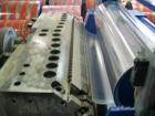 Used Complete Extrusion Line for Flat Sheet PP and PS. Film width up to 850 mm. Film thickness from 0.2 up to 1.5 mm. Consisting of: Kuhne screw diameter 70 mm x 33 D. 4 heating zones, cooling with f...