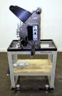 Used C.W. Brabender Univex Lab Take Off. Approximate capacity speeds of up to 30 meters per minute. Consisting of (3) 4” diameter x 8” wide chrome plated, manually adjustable cored rolls, and a top m...