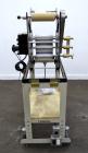Used C.W. Brabender Univex Lab Take Off. Approximate capacity speeds of up to 30 meters per minute. Consisting of (3) 4” diameter x 8” wide chrome plated, manually adjustable cored rolls, and a top m...