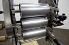 Used C.W. Brabender Univex Lab Take Off. Approximate capacity speeds of up to 30 meters per minute. Consisting of (3) 4” diameter x 8” wide chrome plated, manually adjustable cored rolls, and a top m...