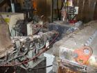 Used Egan 5 Layer Sheet Extrusion Line for the production of PS/PP barrier films with a maximum output 1000-1300 lbs/h (600 kg/h). Line completely rebuilt in 2000 consisting of: (1) Egan extruder scr...