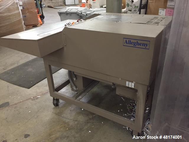 Used Allegheny Paper Shredder, Model 16-150C. 7 1/2 hp, capacity 140-150. Input speed 49'/15 meters per min. 16" wide feed opening, 16" wide cutting assembly. 1/2" clearance cutting assembly. Cutters...