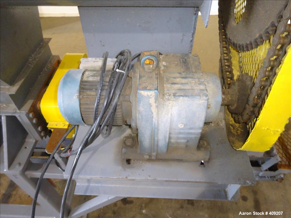 Used Dual Rotor Shredder, Carbon Steel. Approximate chamber 60" x 18".