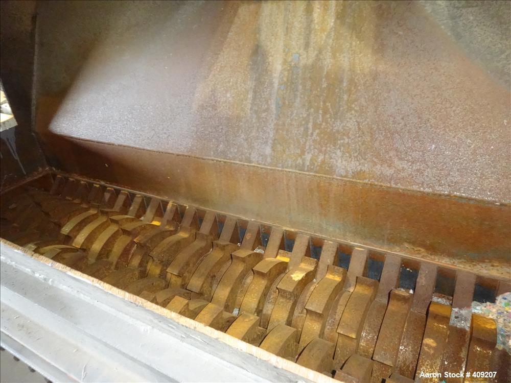 Used Dual Rotor Shredder, Carbon Steel. Approximate chamber 60" x 18".