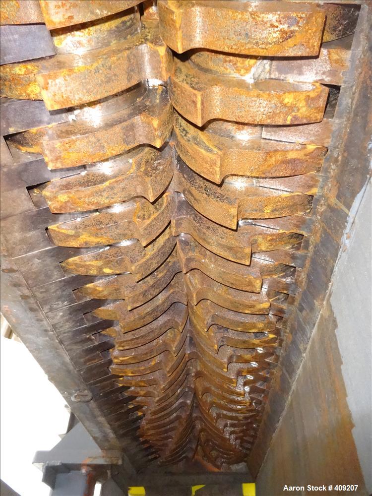 Used Dual Rotor Shredder, Carbon Steel. Approximate chamber 60" x 18".