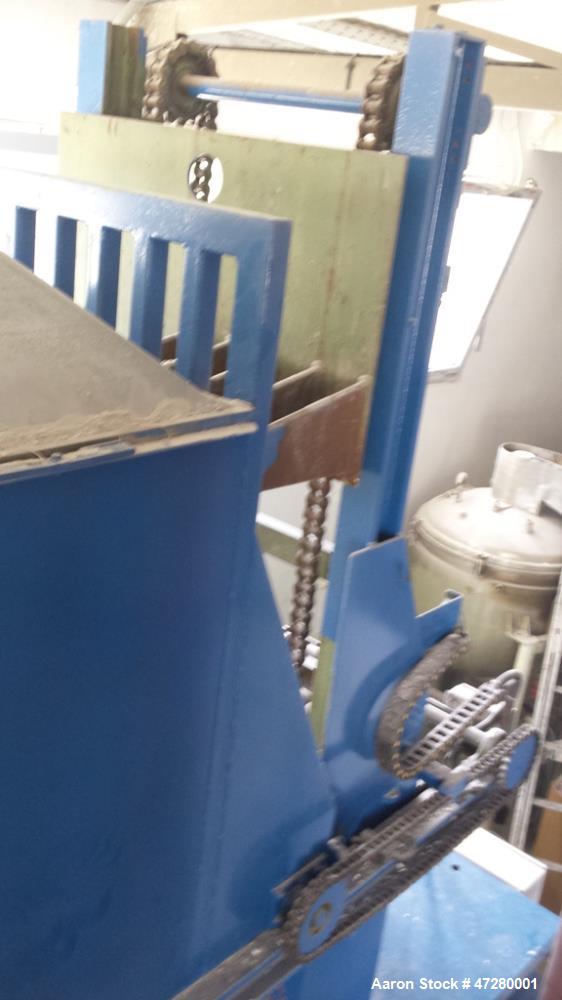 Used Untha Four Shaft Shredder, Model RS40. 2 x 15kw. Cutting chamber 750 x 700. Extra pushing fuction, pusher is connected via a PLC. Mfg. 1995.