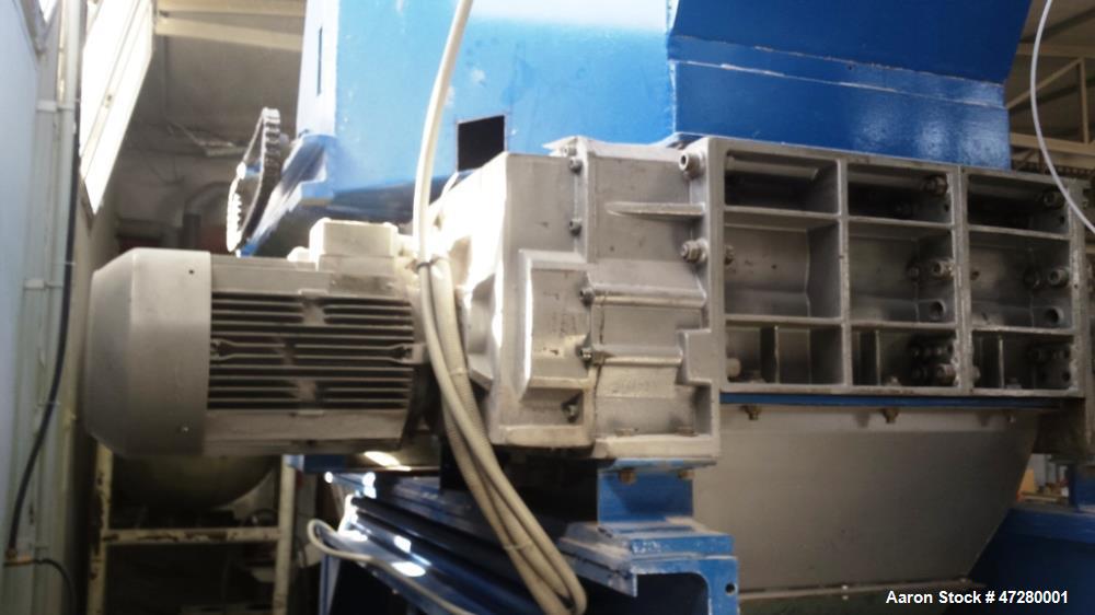 Used Untha Four Shaft Shredder, Model RS40. 2 x 15kw. Cutting chamber 750 x 700. Extra pushing fuction, pusher is connected via a PLC. Mfg. 1995.