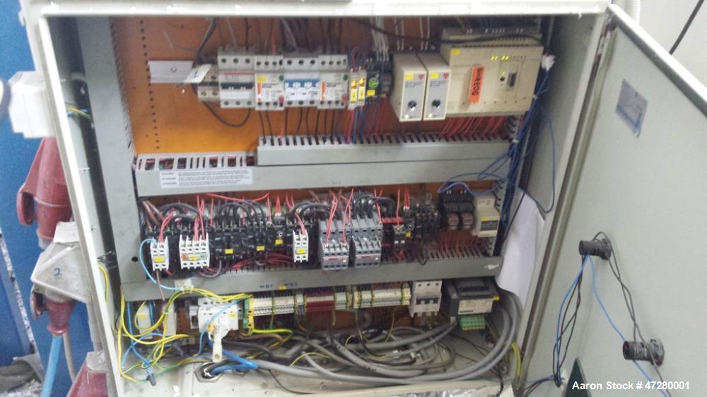 Used Untha Four Shaft Shredder, Model RS40. 2 x 15kw. Cutting chamber 750 x 700. Extra pushing fuction, pusher is connected via a PLC. Mfg. 1995.