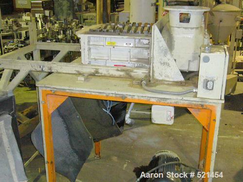 USED: Ball & Jewel model SB-10/615A 25 hp dual rotor shredder having 19 single teeth rotors. Blades are 1-1/8" wide. 19" x 23" throat. Caster mounted roll away feed hopper. With Ball & Jewell model N...