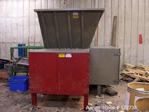 USED: Eco-Line single rotor shreder, model GT04-3-045, 75 hp. 14" diameter x 52" wide rotor, 31" ram stroke, 118 small cutters, 4 small cutter bars, 4 screens. Approximate overall dimensions: 100" x ...