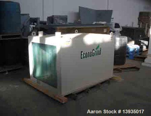Used EconoGrind single shaft shredder, model ESS 1200. Feed throat opening 55.9" x 49.4", rotor diameter 18", hyd ram, 100 hp with controls.