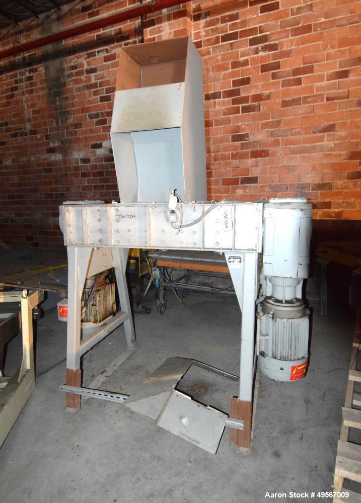 Used Hosokawa Polymer Systems Twin Shaft Crusher, Model HPS 2218. (1) Carbon steel rotors approximate 6" diameter x 18" wide. Front rotor driven by a 15hp, 3/60/230/460 volt, 1750 rpm gear motor, rat...