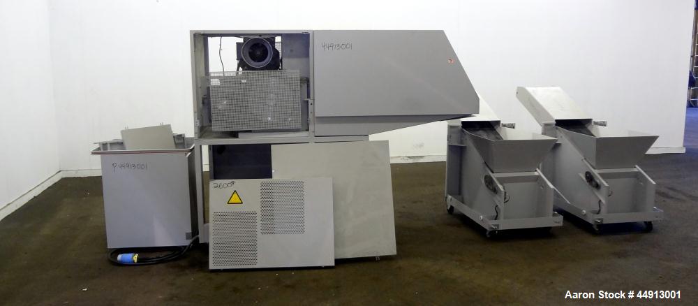 Used MBM Corporation Ideal DestroyIt Shredder, Model 5009-2.  20" Feed opening.  Particle size 11/32" x 1-1/2" to 3", sheet capacity 600, shred speed 24 to 46 feet per minute with conveyor. Automatic...