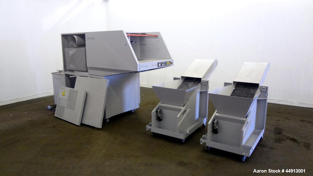 Used MBM Corporation Ideal DestroyIt Shredder, Model 5009-2.  20" Feed opening.  Particle size 11/32" x 1-1/2" to 3", sheet capacity 600, shred speed 24 to 46 feet per minute with conveyor. Automatic...
