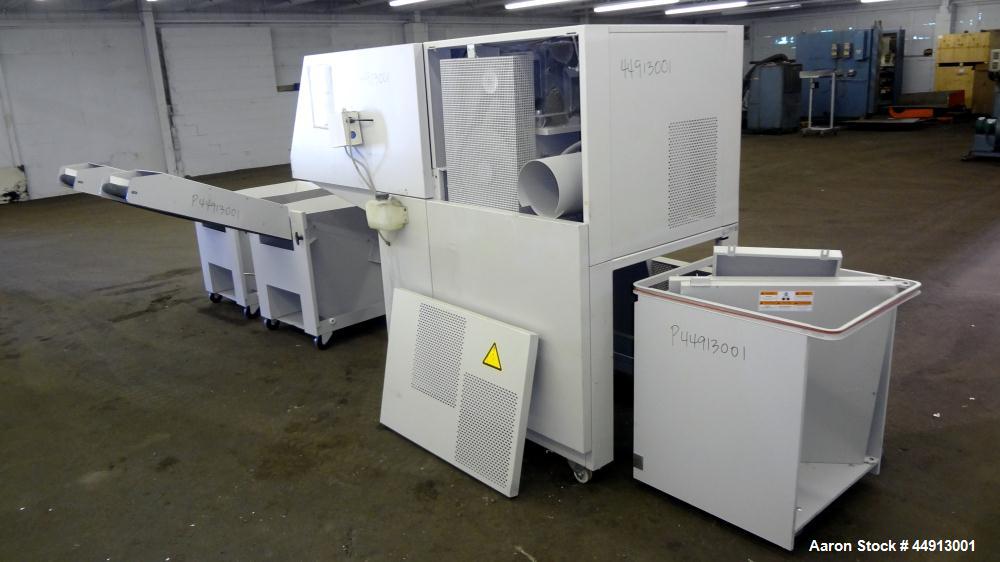Used MBM Corporation Ideal DestroyIt Shredder, Model 5009-2.  20" Feed opening.  Particle size 11/32" x 1-1/2" to 3", sheet capacity 600, shred speed 24 to 46 feet per minute with conveyor. Automatic...