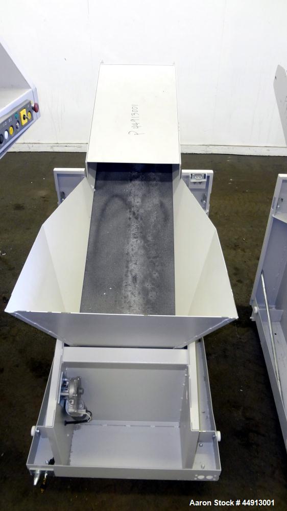 Used MBM Corporation Ideal DestroyIt Shredder, Model 5009-2.  20" Feed opening.  Particle size 11/32" x 1-1/2" to 3", sheet capacity 600, shred speed 24 to 46 feet per minute with conveyor. Automatic...