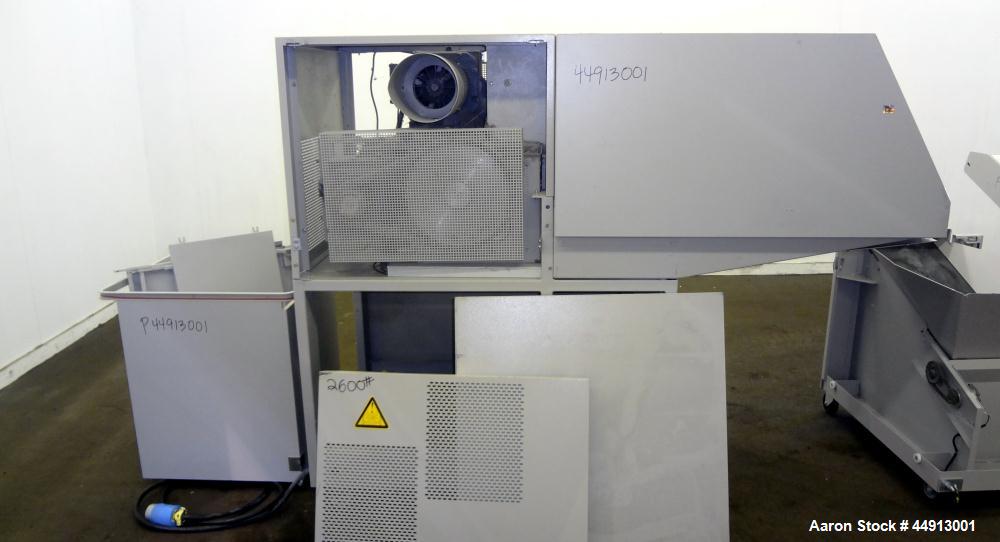 Used MBM Corporation Ideal DestroyIt Shredder, Model 5009-2.  20" Feed opening.  Particle size 11/32" x 1-1/2" to 3", sheet capacity 600, shred speed 24 to 46 feet per minute with conveyor. Automatic...