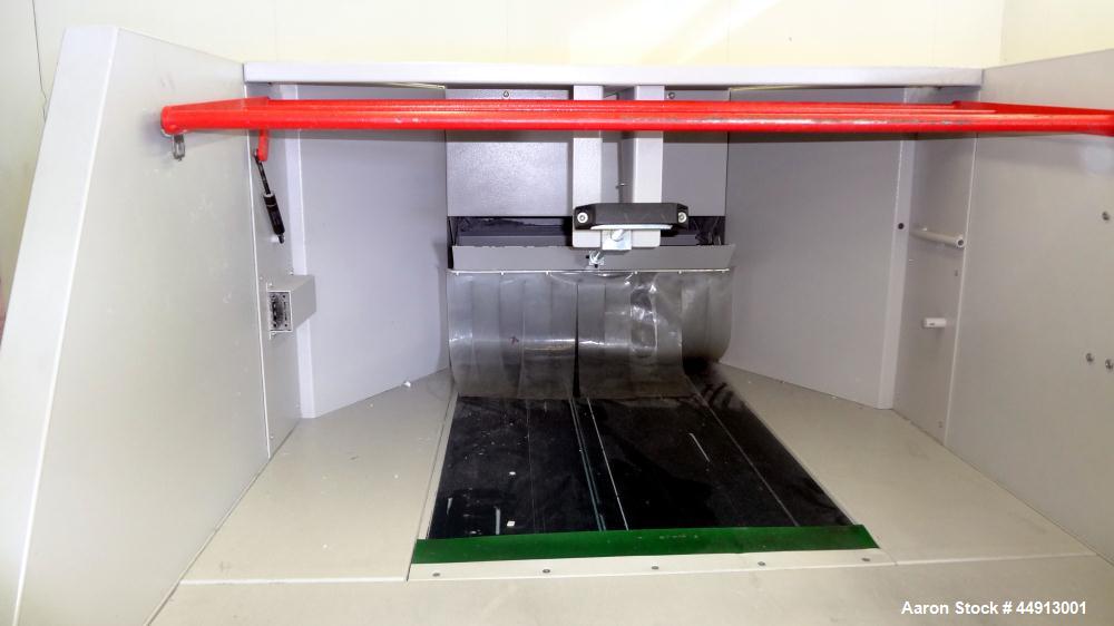 Used MBM Corporation Ideal DestroyIt Shredder, Model 5009-2.  20" Feed opening.  Particle size 11/32" x 1-1/2" to 3", sheet capacity 600, shred speed 24 to 46 feet per minute with conveyor. Automatic...