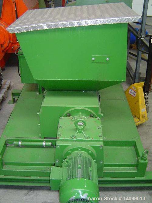Used Mewa UC 35 Two Shaft Shredder for pre-shredding.  Motor 7.5 hp (5.5 kW).  Feed opening 13.7" x 19.6" (350 x 500 mm).  Rotor 13.7" (width 350 mm).