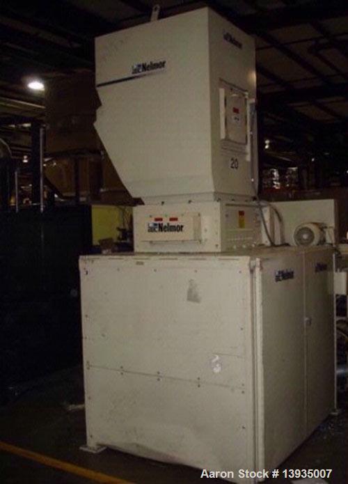 Used 1997 Nelmor Shredder/Granulator Combo. Nelmor SH2525, 25" x 25" cutting chamber area, 20 hp, dual rotor with auto reverse. Nelmor granulator with 12" x 29.5" opening, 3 blade rotor, blower and c...
