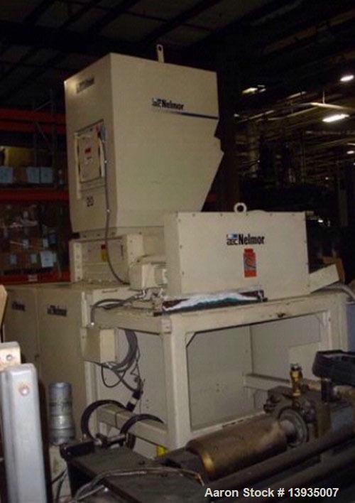 Used 1997 Nelmor Shredder/Granulator Combo. Nelmor SH2525, 25" x 25" cutting chamber area, 20 hp, dual rotor with auto reverse. Nelmor granulator with 12" x 29.5" opening, 3 blade rotor, blower and c...