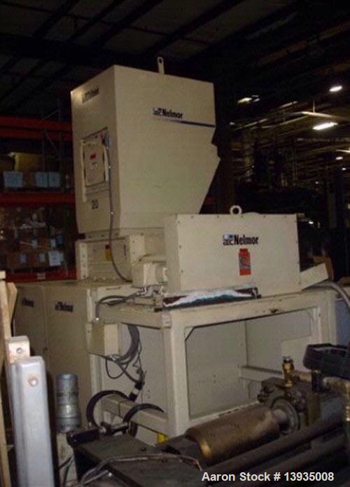 Used 1997 Nelmor Shredder/Granulator Combo. Nelmor SH2525, 25" x 25" cutting chamber area, 20 hp, dual rotor with auto reverse. Nelmor granulator with 12" x 29.5" opening, 3 blade rotor, blower and c...