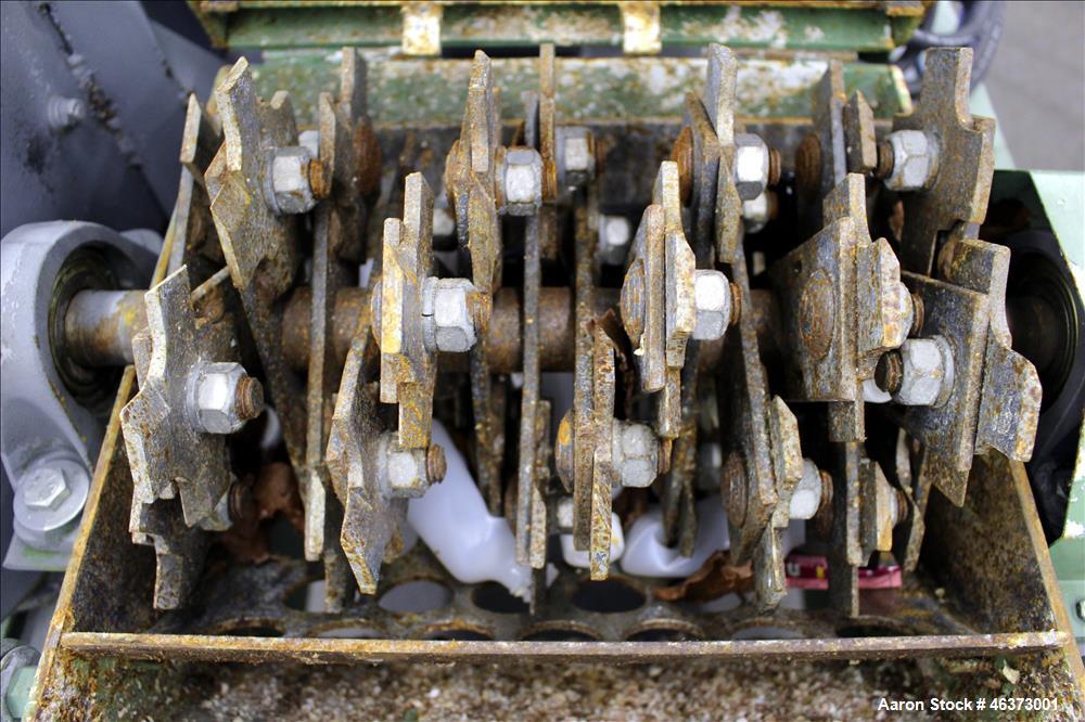 Used Prodeva Single Rotor Plastics Shredder, Model 315-S, Carbon Steel. Cutting chamber approximately 15" long x 11" wide. Approximately 10" diameter x 13-1/2" long single open rotor with (32) bolt o...
