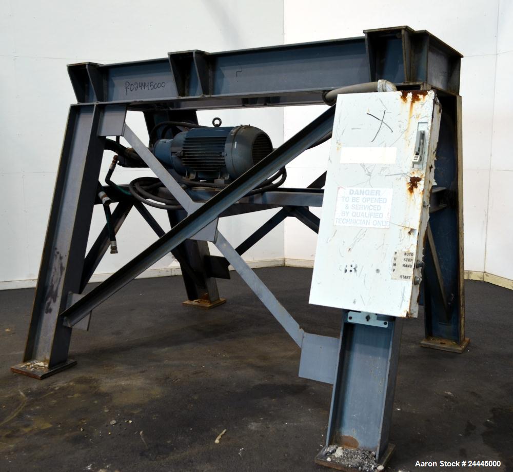 Used Eldan Recycling / E. Laursens Rasper, Model R1400/4, Carbon Steel. (1) Single shaft with wedge mounted blades. Hydraulically driven. Includes a feed hopper, and stand. Designed for preparing for...