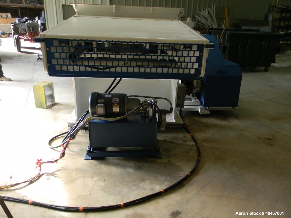 Used Retech Shredder/Grinder, Model 52/100. 40 mm rotating cutters with 4 points. Changeable counter knife. 100 hp motor with new fluid drive coupling and a rebuilt link belt gear box. Control panel....