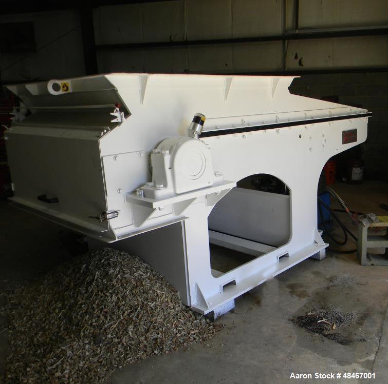 Used Retech Shredder/Grinder, Model 52/100. 40 mm rotating cutters with 4 points. Changeable counter knife. 100 hp motor with new fluid drive coupling and a rebuilt link belt gear box. Control panel....