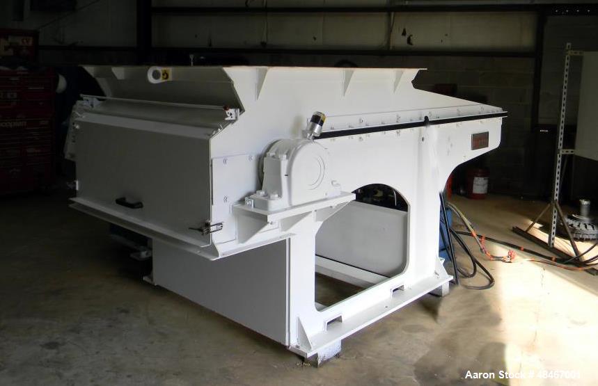 Used Retech Shredder/Grinder, Model 52/100. 40 mm rotating cutters with 4 points. Changeable counter knife. 100 hp motor with new fluid drive coupling and a rebuilt link belt gear box. Control panel....
