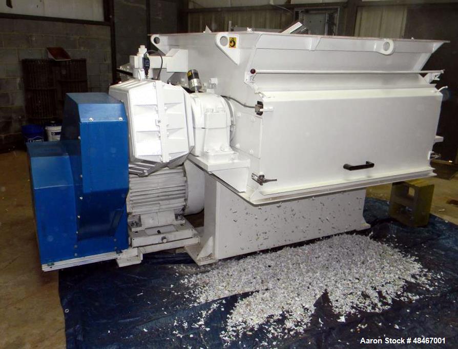 Used Retech Shredder/Grinder, Model 52/100. 40 mm rotating cutters with 4 points. Changeable counter knife. 100 hp motor with new fluid drive coupling and a rebuilt link belt gear box. Control panel....
