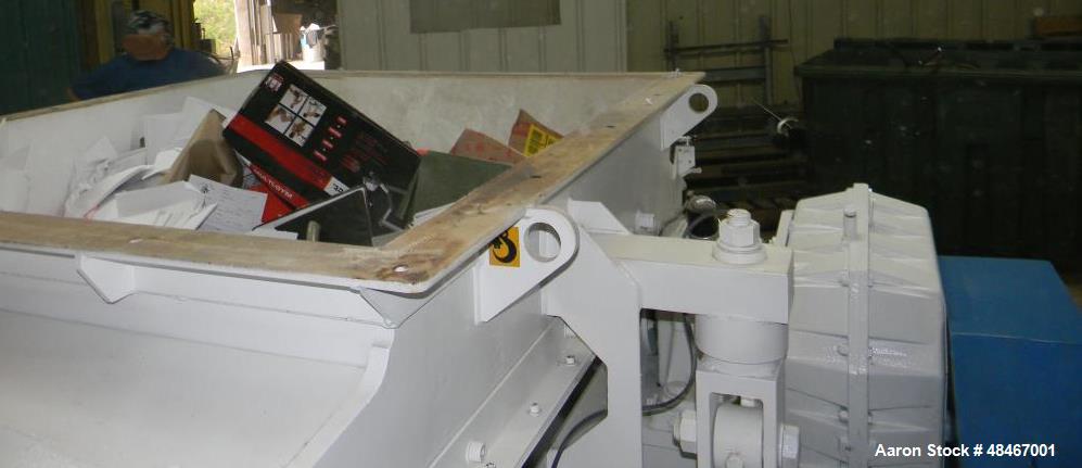 Used Retech Shredder/Grinder, Model 52/100. 40 mm rotating cutters with 4 points. Changeable counter knife. 100 hp motor with new fluid drive coupling and a rebuilt link belt gear box. Control panel....