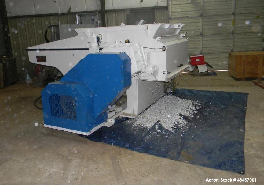 Used Retech Shredder/Grinder, Model 52/100. 40 mm rotating cutters with 4 points. Changeable counter knife. 100 hp motor with new fluid drive coupling and a rebuilt link belt gear box. Control panel....