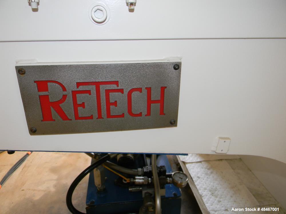 Used Retech Shredder/Grinder, Model 52/100. 40 mm rotating cutters with 4 points. Changeable counter knife. 100 hp motor with new fluid drive coupling and a rebuilt link belt gear box. Control panel....