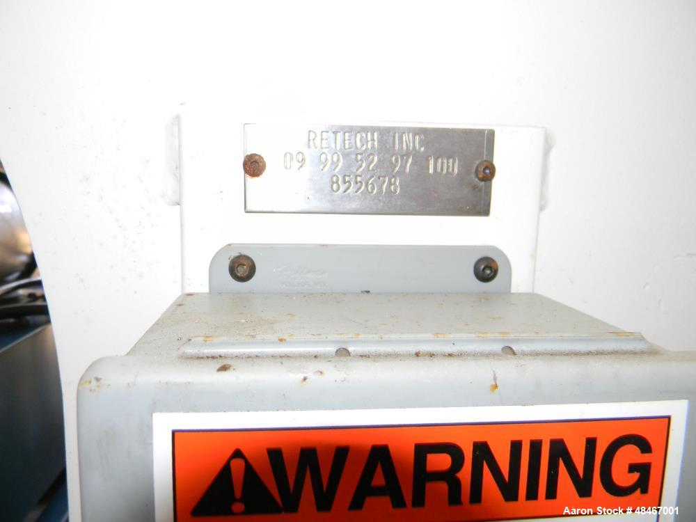 Used Retech Shredder/Grinder, Model 52/100. 40 mm rotating cutters with 4 points. Changeable counter knife. 100 hp motor with new fluid drive coupling and a rebuilt link belt gear box. Control panel....