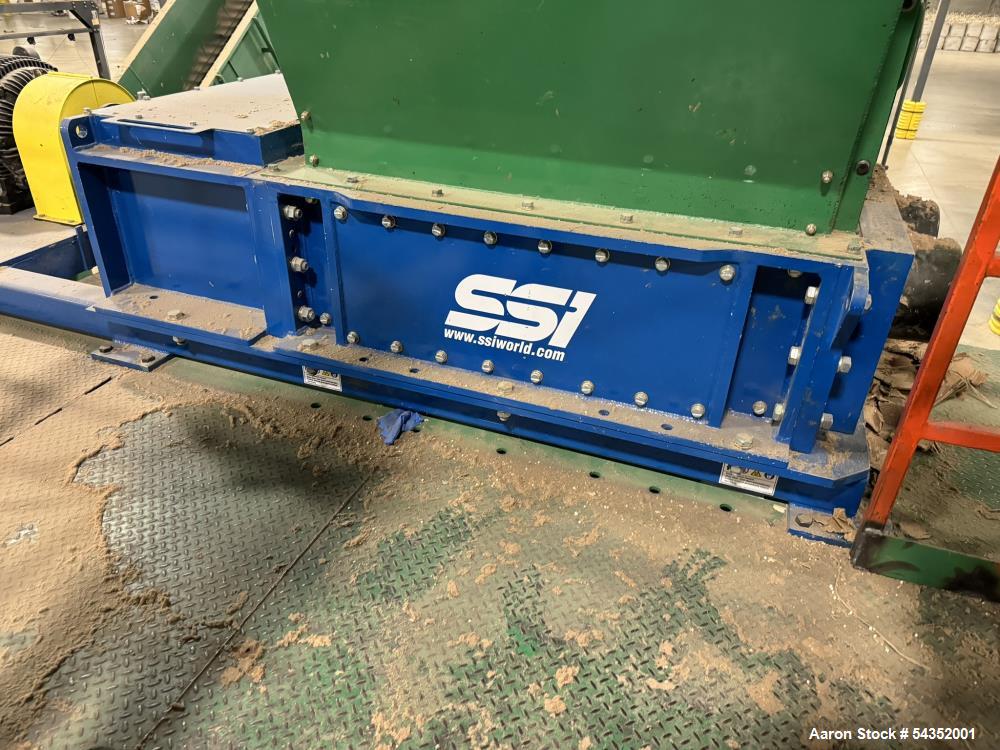 Used SSI Twin Shaft Dual-Shear Shredder, Model M85E(52), Serial# S3069. Approximate cutting chamber 35" x 52", (1) 100hp, 3/60/440/460 volt, 1785 rpm motor & control panel.