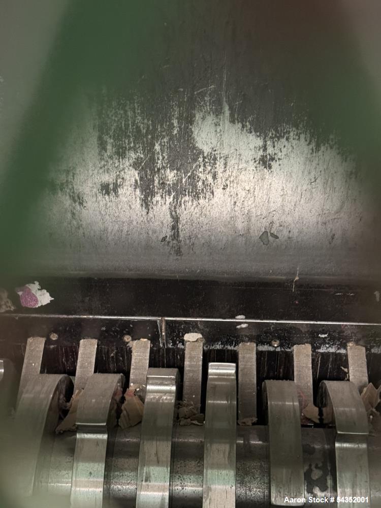 Used SSI Twin Shaft Dual-Shear Shredder, Model M85E(52), Serial# S3069. Approximate cutting chamber 35" x 52", (1) 100hp, 3/60/440/460 volt, 1785 rpm motor & control panel.