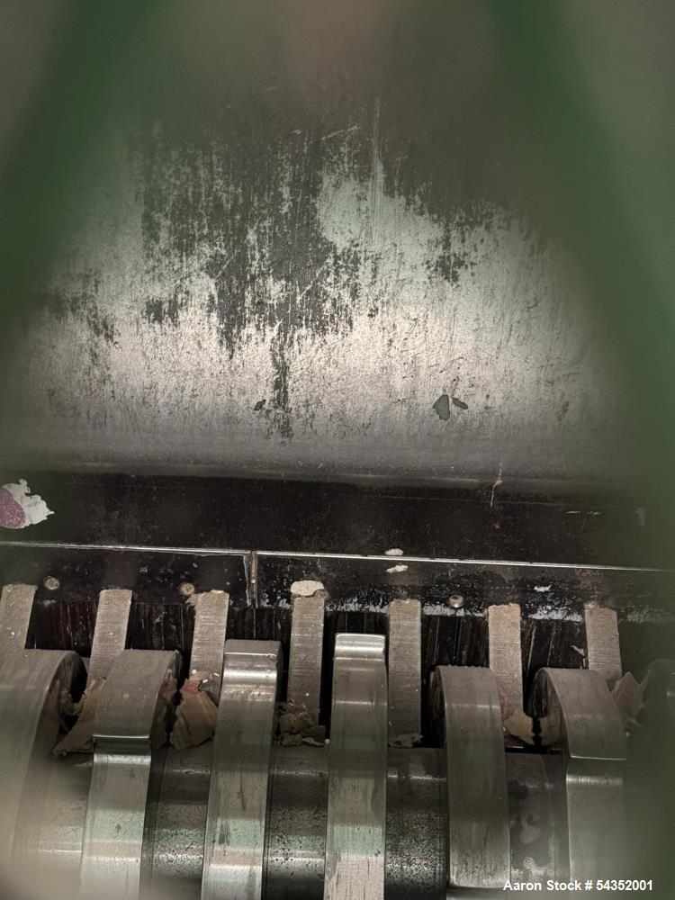 Used SSI Twin Shaft Dual-Shear Shredder, Model M85E(52), Serial# S3069. Approximate cutting chamber 35" x 52", (1) 100hp, 3/60/440/460 volt, 1785 rpm motor & control panel.