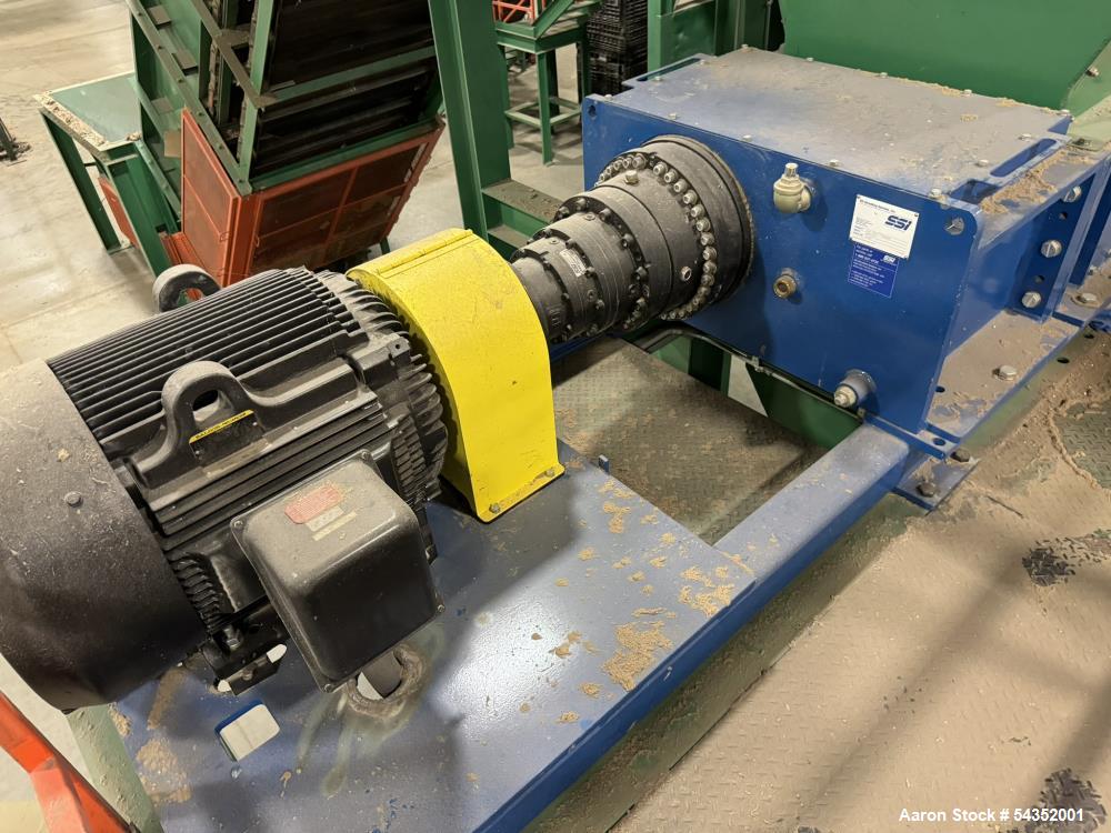 Used SSI Twin Shaft Dual-Shear Shredder, Model M85E(52), Serial# S3069. Approximate cutting chamber 35" x 52", (1) 100hp, 3/60/440/460 volt, 1785 rpm motor & control panel.