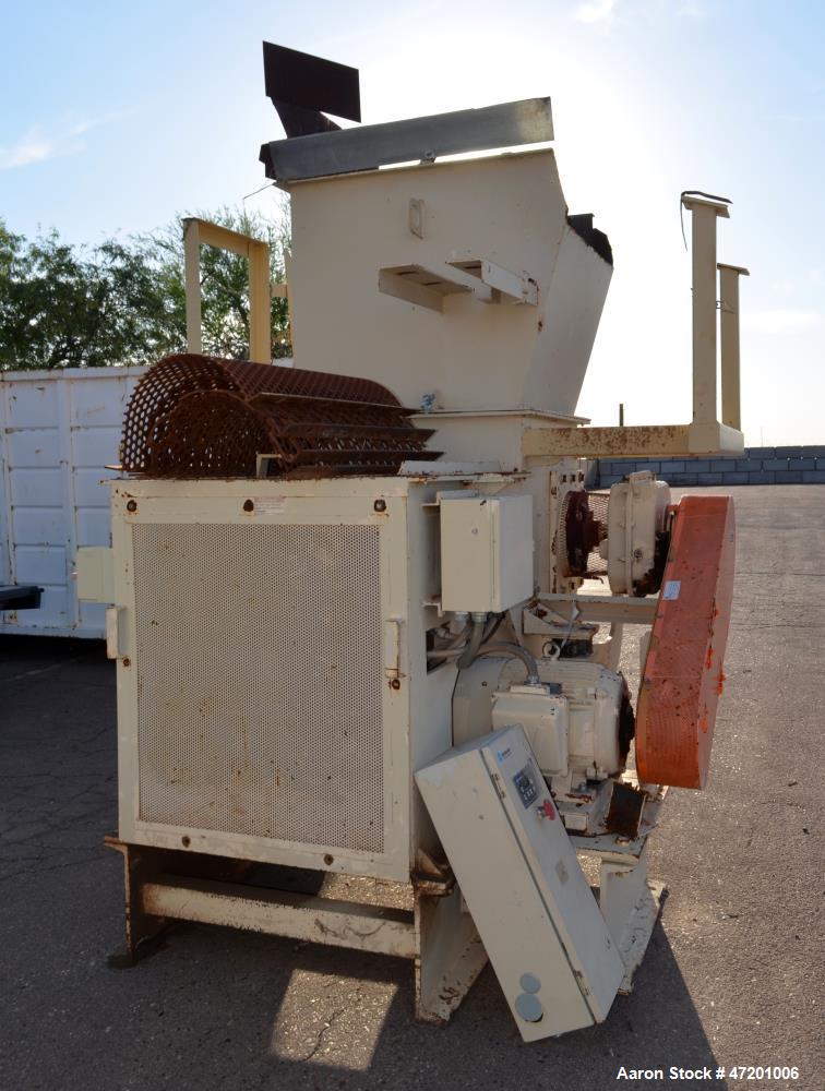 Used Schutte-Buffalo MP Series Slow Speed Ram Feed Grinder, Model MP-30, Carbon Steel. Approximate 15" diameter x 36" wide rotor with bolt on knifes. 36" x 36" Feed opening with hopper, and hydraulic...