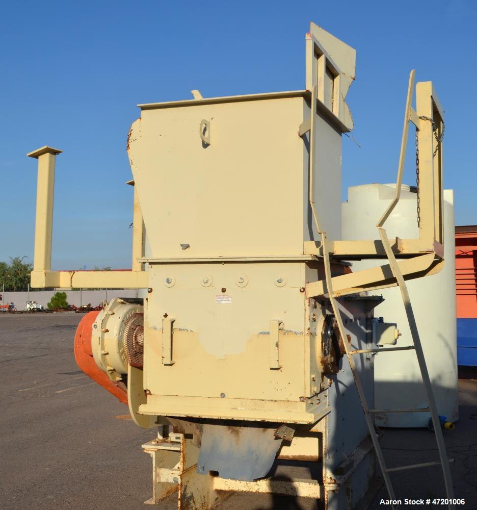 Used Schutte-Buffalo MP Series Slow Speed Ram Feed Grinder, Model MP-30, Carbon Steel. Approximate 15" diameter x 36" wide rotor with bolt on knifes. 36" x 36" Feed opening with hopper, and hydraulic...