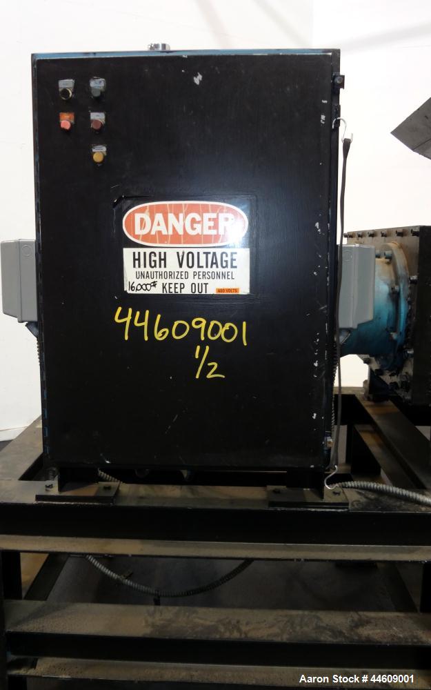 Used Shred-Pax Twin Shaft Shredder, Model AZ-80 EP, Carbon Steel. (2) Rows of intermeshing hook knives approximately 1-3/4" thick. 34" x 52" Feed opening with a hopper, bottom discharge. Each shaft d...